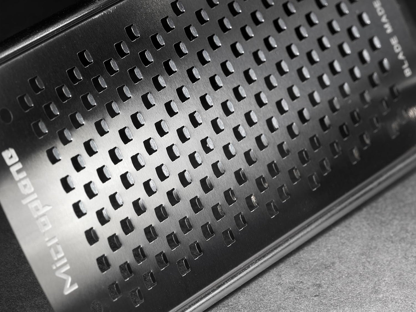 Microplane Gourmet Series Cheese Grater with Soft Touch Handle (Extra Coarse, Black)