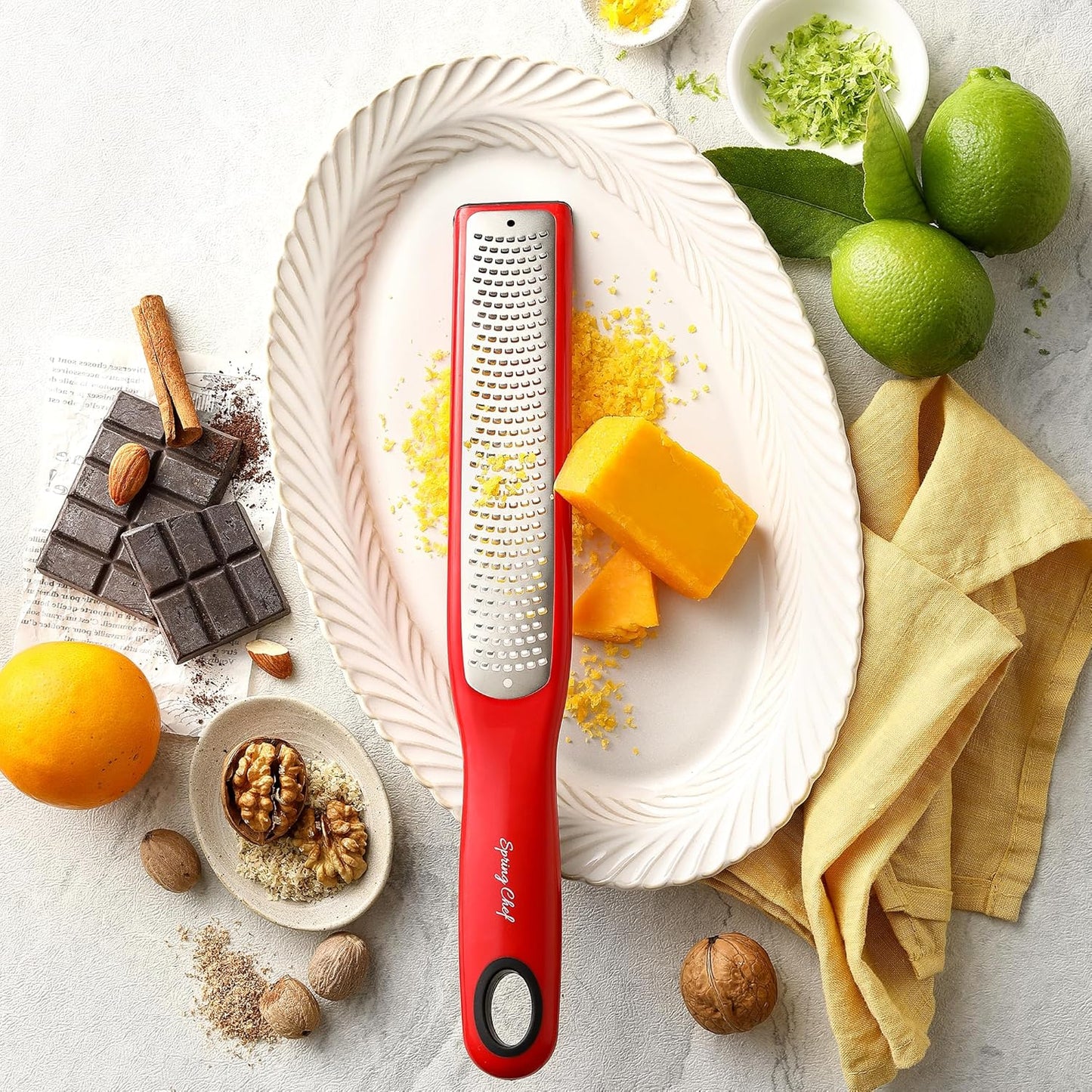 Spring Chef Premium Lemon Zester Grater with Handle - Fruits, Garlic, Chocolate, Nutmeg, Ginger Grater - Heavy Duty Kitchen Tool - Stainless Steel Citrus Zester with Blade Cover - Fine Shred, Black