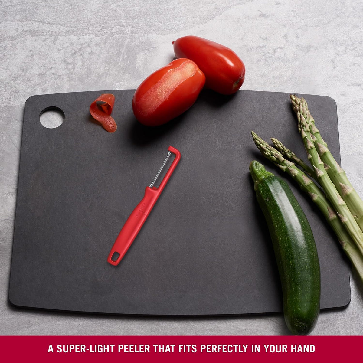Iota Peeler for Vegetables Fruits, Serrated Edge,Swiss Made, Red