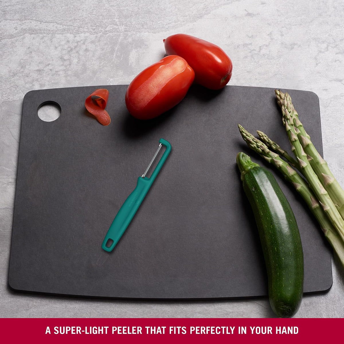 Iota Peeler for Vegetables Fruits, Serrated Edge,Swiss Made, Red