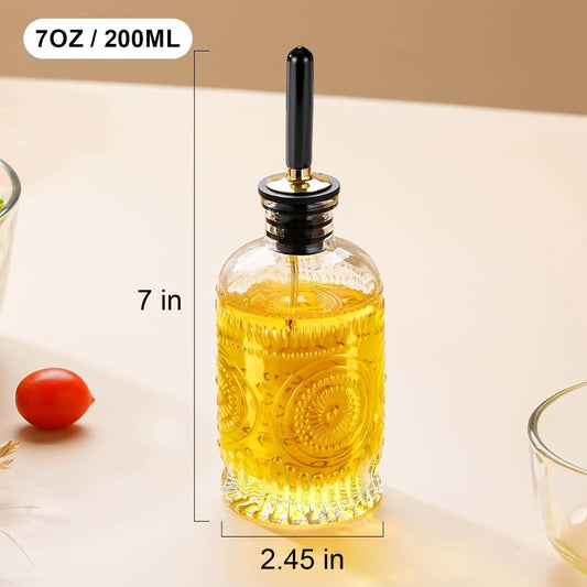 Glass Olive Oil Dispenser Bottle, Small 7oz, Metal Spout, 1 Pack | This small olive oil dispenser has embossed glass for grip and vintage kitchen style; its clear body shows when to refill