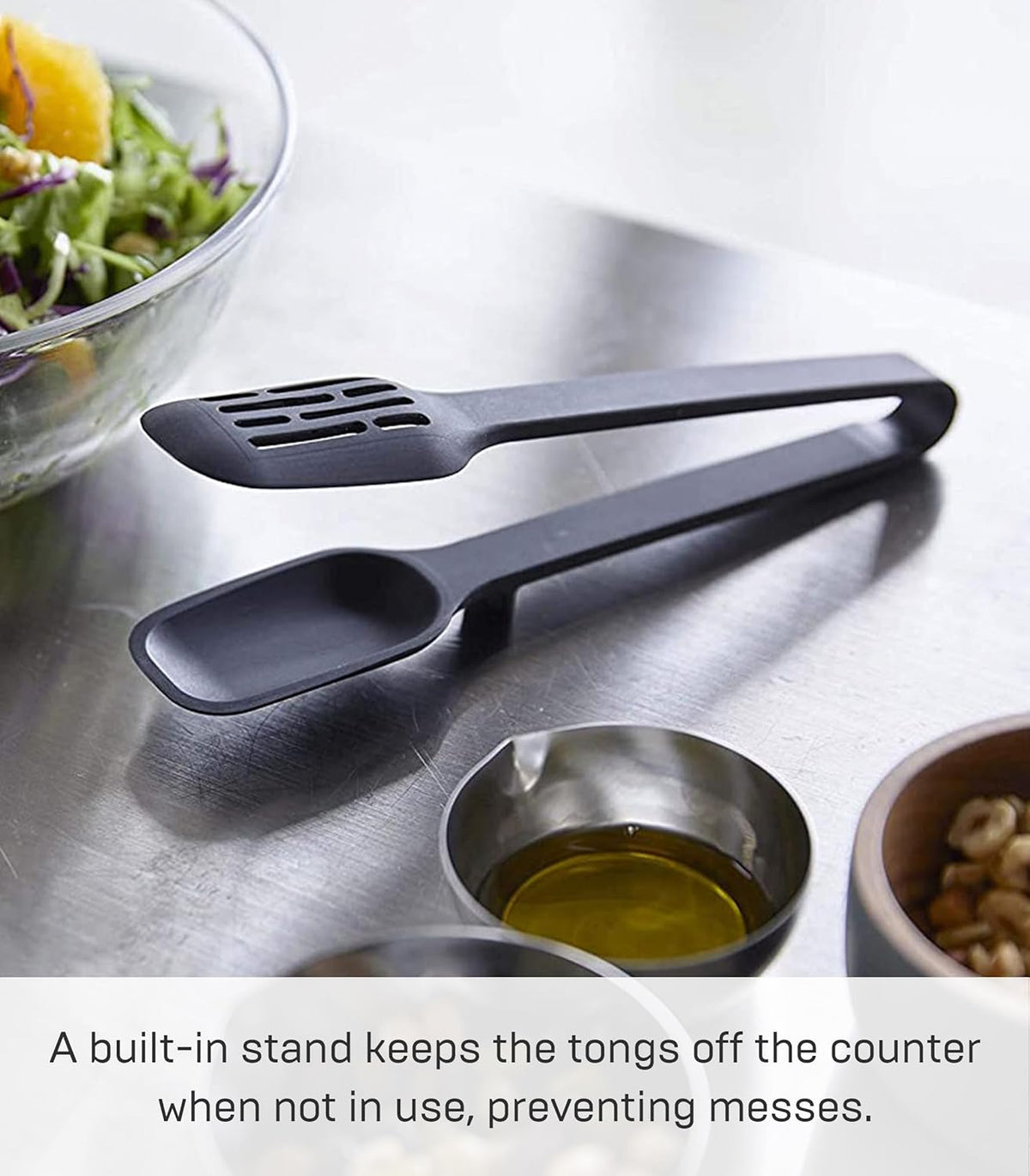 Home Silicone Kitchen Tongs, Silicone, No Assembly Req., Black | Silicone kitchen utensils designed to stay off countertops. Floating design keeps surfaces clean. Durable, easy to clean.