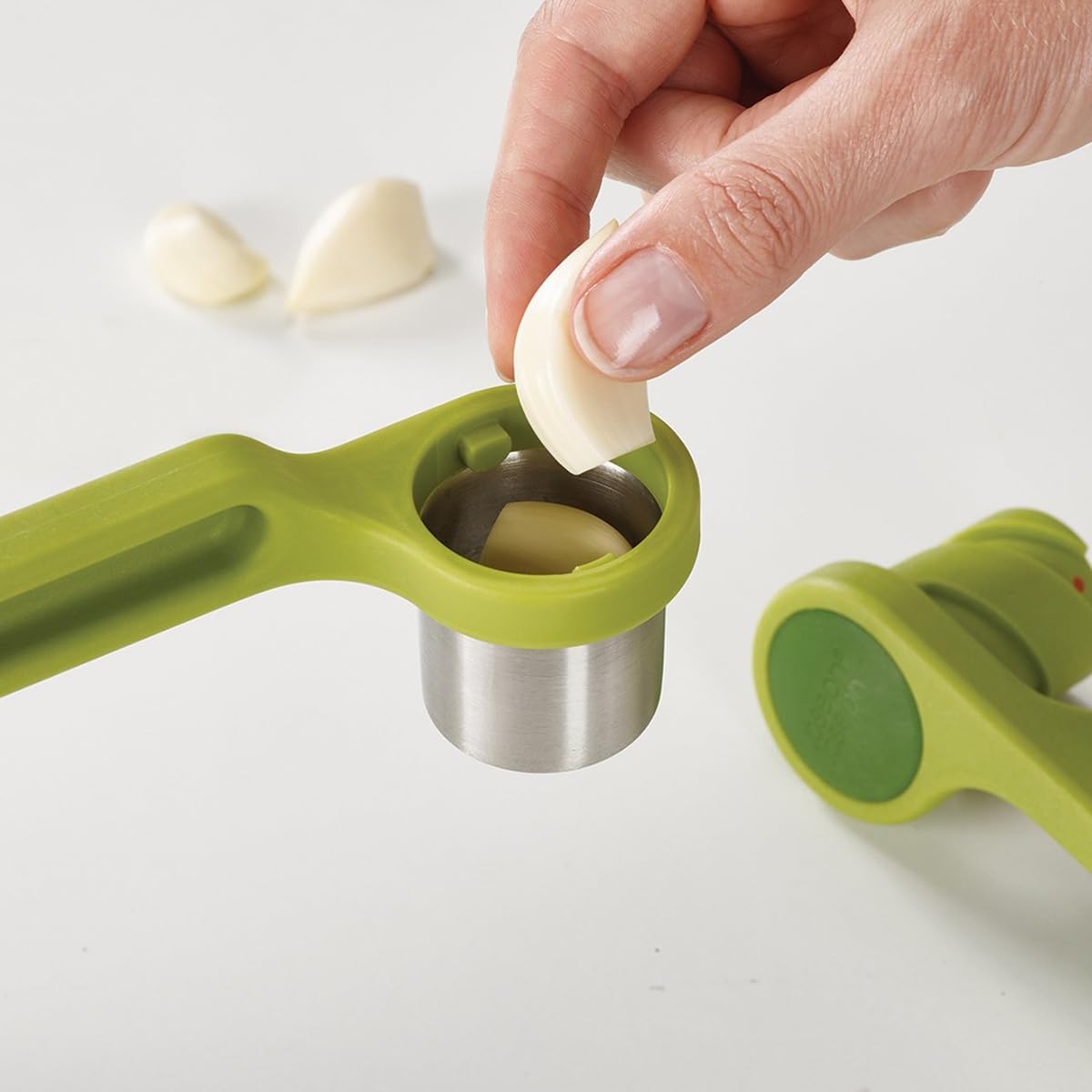 Helix Garlic Press Mincer Ergonomic Twist-Action Hand Juicer, Stainless Steel