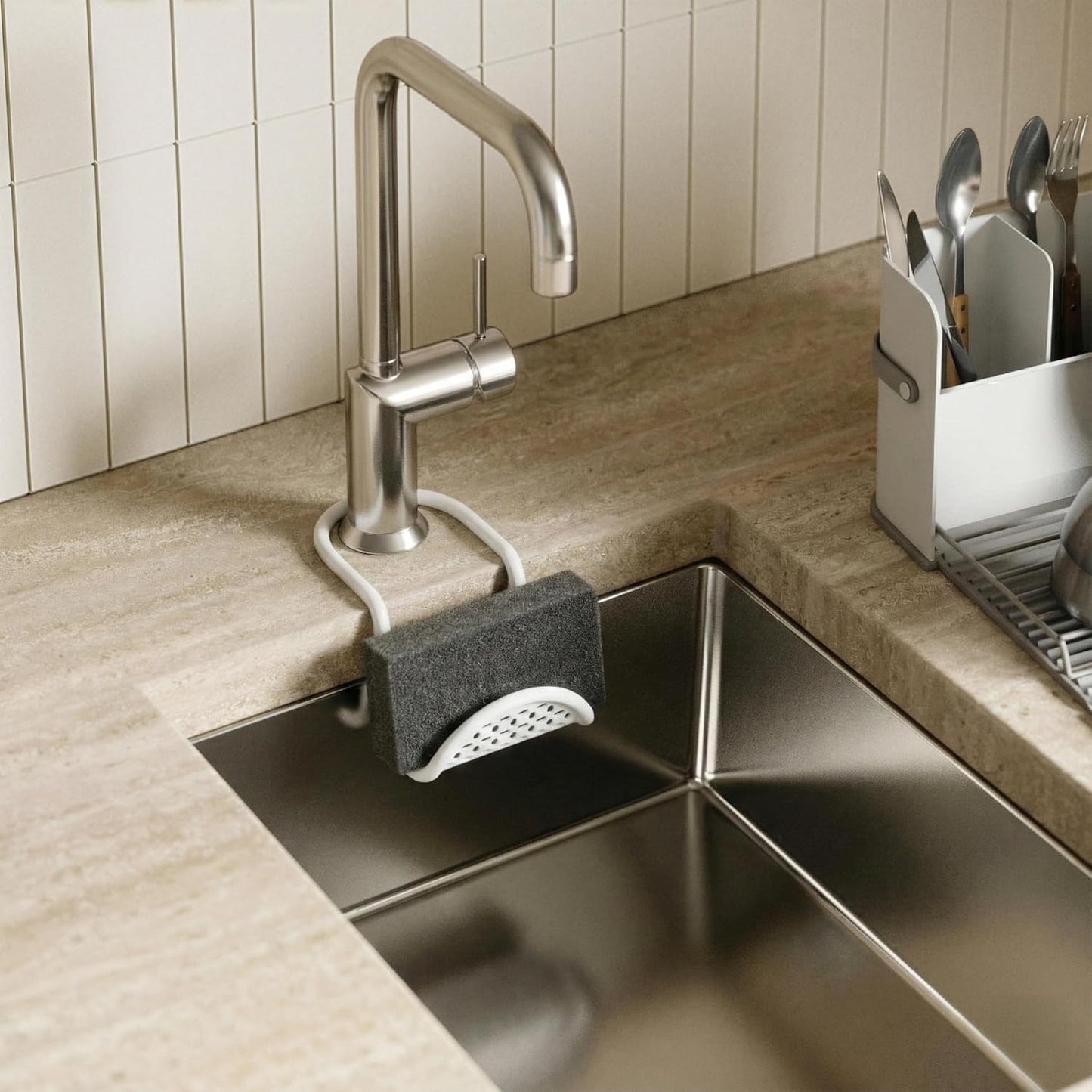 Sling Flexible Sink Caddy, Elastic Non-Slip Sponge Holder, White | Rubber material, perforated base for drainage, prevents moisture buildup, fits faucet necks, easy rinse clean