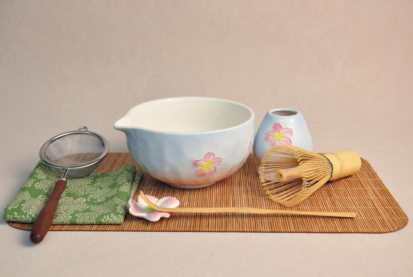 Complete matcha kit with ceramic bowl, bamboo whisk, whisk holder, scoop and sifter, designed for Japanese tea ceremony, daily matcha and gifts.