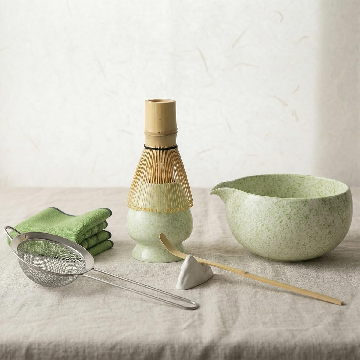 Complete matcha kit with ceramic bowl, bamboo whisk, whisk holder, scoop and sifter, designed for Japanese tea ceremony, daily matcha and gifts.
