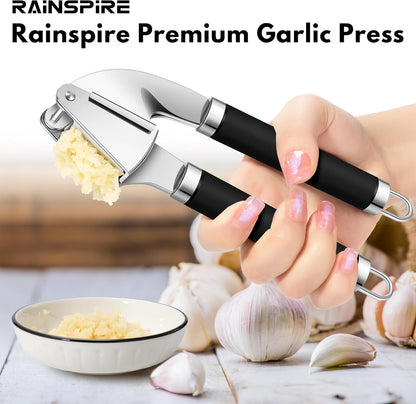 Premium Garlic Press Stainless Steel, Garlic Mincer Tool, Garlic Crusher Tool, Garlic Smasher Garlic Masher Includes Silicone Garlic Peeler & Cleaning Brush, Dishwasher Safe (Black)