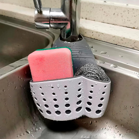 Hanging Sponge Holder for Kitchen Sink, Over Faucet Silicone Caddy | Adjustable Strap Wraps Most Taps While Drain Holes Let Sponges Dry Fast - White Silicone Wipes Clean, No Suction Cups Needed