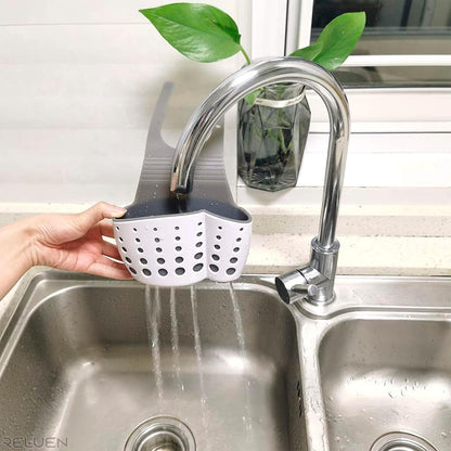 Hanging Sponge Holder for Kitchen Sink, Over Faucet Silicone Caddy | Adjustable Strap Wraps Most Taps While Drain Holes Let Sponges Dry Fast - White Silicone Wipes Clean, No Suction Cups Needed