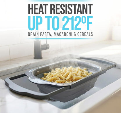 Gray Collapsible Silicone Over-Sink Colander – 6 Qt – Extendable | Gray; silicone; 17.1"L x 10.1"W; collapses to 1.4"H; 6 Qt; handles extend 25" to span sink; heat resistant 176F