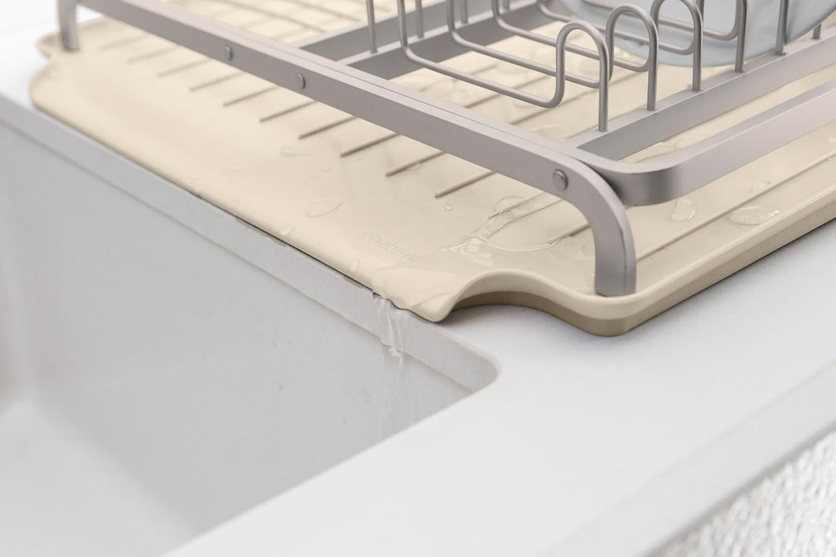 SinkSide Dish Drying Rack (Soft Beige), Sleek Sink Organizer with Removable Cutlery Basket, Versatile Sink Drainer for Dishes and Kitchen Accessories