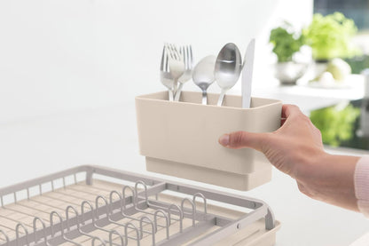 SinkSide Dish Drying Rack (Soft Beige), Sleek Sink Organizer with Removable Cutlery Basket, Versatile Sink Drainer for Dishes and Kitchen Accessories
