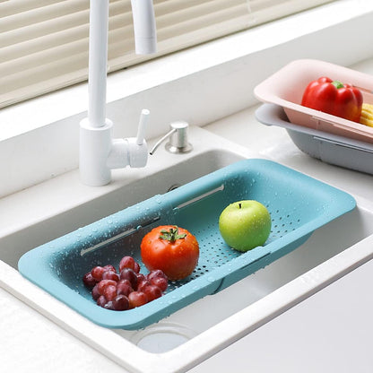 Collapsible Sink Colanders and Strainers Basket Over the Sink Colander Collapsible Colander Extendable Plastic Fruit Vegetable Strainer Drainer Basket for Kitchen(Length 14.3 inch-19.4 inch) (Pink)