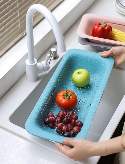 Collapsible Sink Colanders and Strainers Basket Over the Sink Colander Collapsible Colander Extendable Plastic Fruit Vegetable Strainer Drainer Basket for Kitchen(Length 14.3 inch-19.4 inch) (Pink)