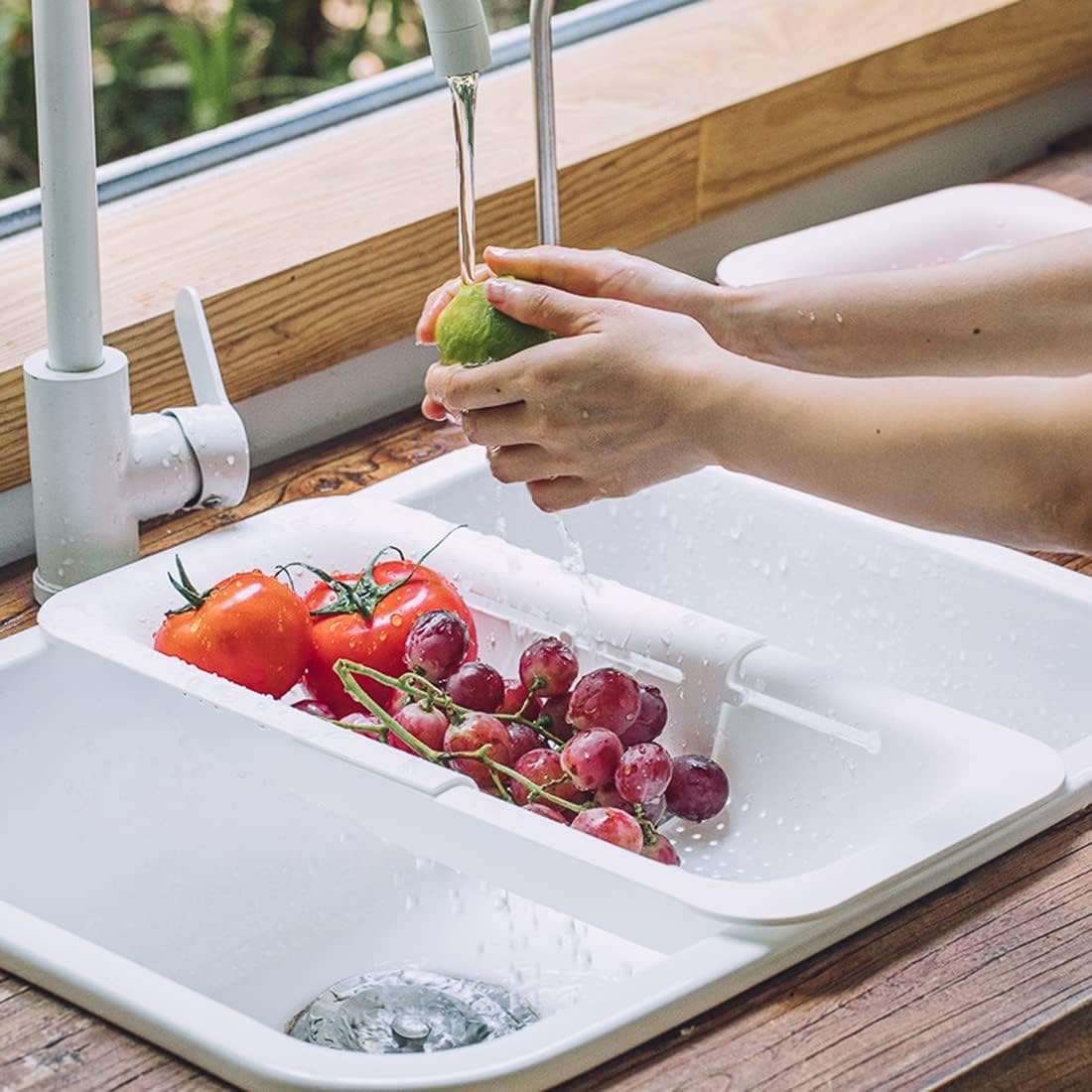 Collapsible Sink Colanders and Strainers Basket Over the Sink Colander Collapsible Colander Extendable Plastic Fruit Vegetable Strainer Drainer Basket for Kitchen(Length 14.3 inch-19.4 inch) (Pink)