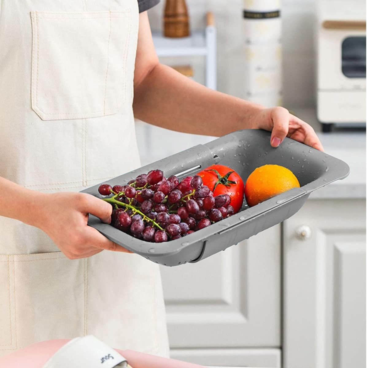 Collapsible Sink Colanders and Strainers Basket Over the Sink Colander Collapsible Colander Extendable Plastic Fruit Vegetable Strainer Drainer Basket for Kitchen(Length 14.3 inch-19.4 inch) (Pink)