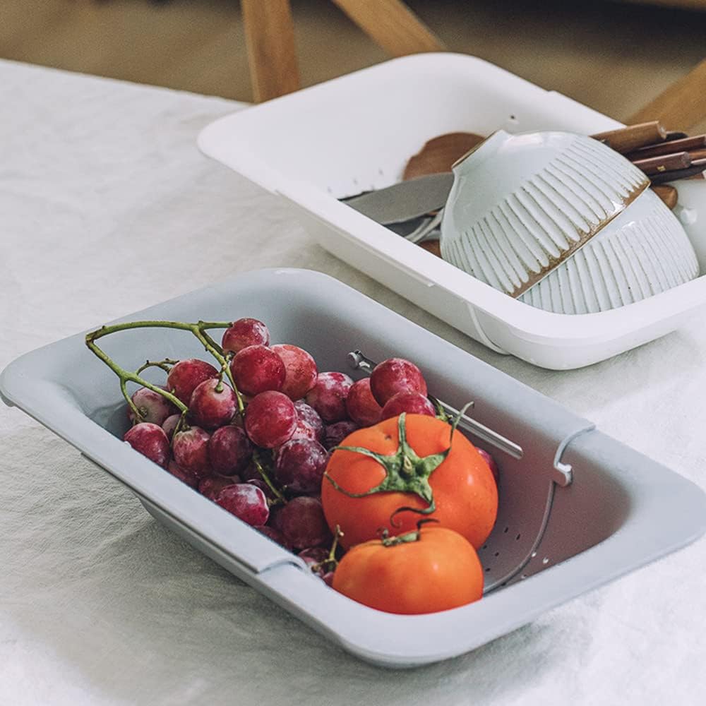 Collapsible Sink Colanders and Strainers Basket Over the Sink Colander Collapsible Colander Extendable Plastic Fruit Vegetable Strainer Drainer Basket for Kitchen(Length 14.3 inch-19.4 inch) (Pink)