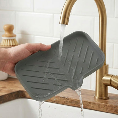 Silicone Soap Dish with Drain Spout, Self-Draining Sink Organizer Tray for Bathroom and Kitchen, Sponges, Dispensers and Soap Holder, Non-Slip and Dishwasher Safe, Black (Compact, 4.9"×3.2")