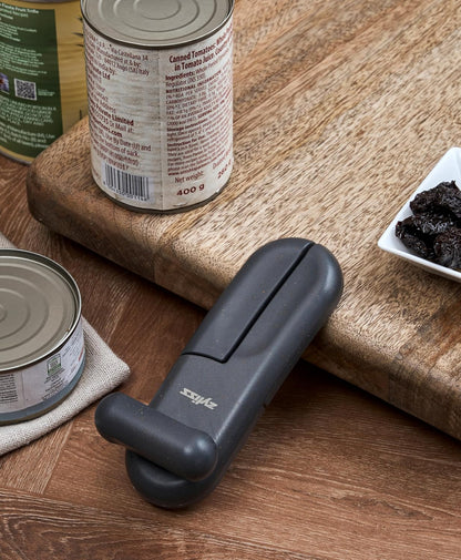 MagiCan Manual Can Opener with Lid Release - Heavy Duty Can Opener - Easy to Use Hand Held - Effortlessly Open Cans - Compact Design - Red