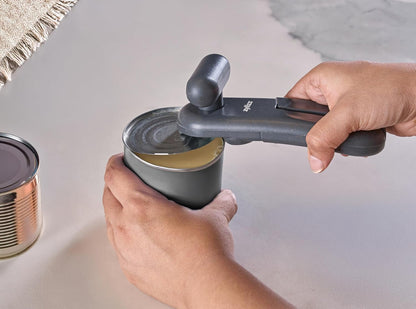 MagiCan Manual Can Opener with Lid Release - Heavy Duty Can Opener - Easy to Use Hand Held - Effortlessly Open Cans - Compact Design - Red