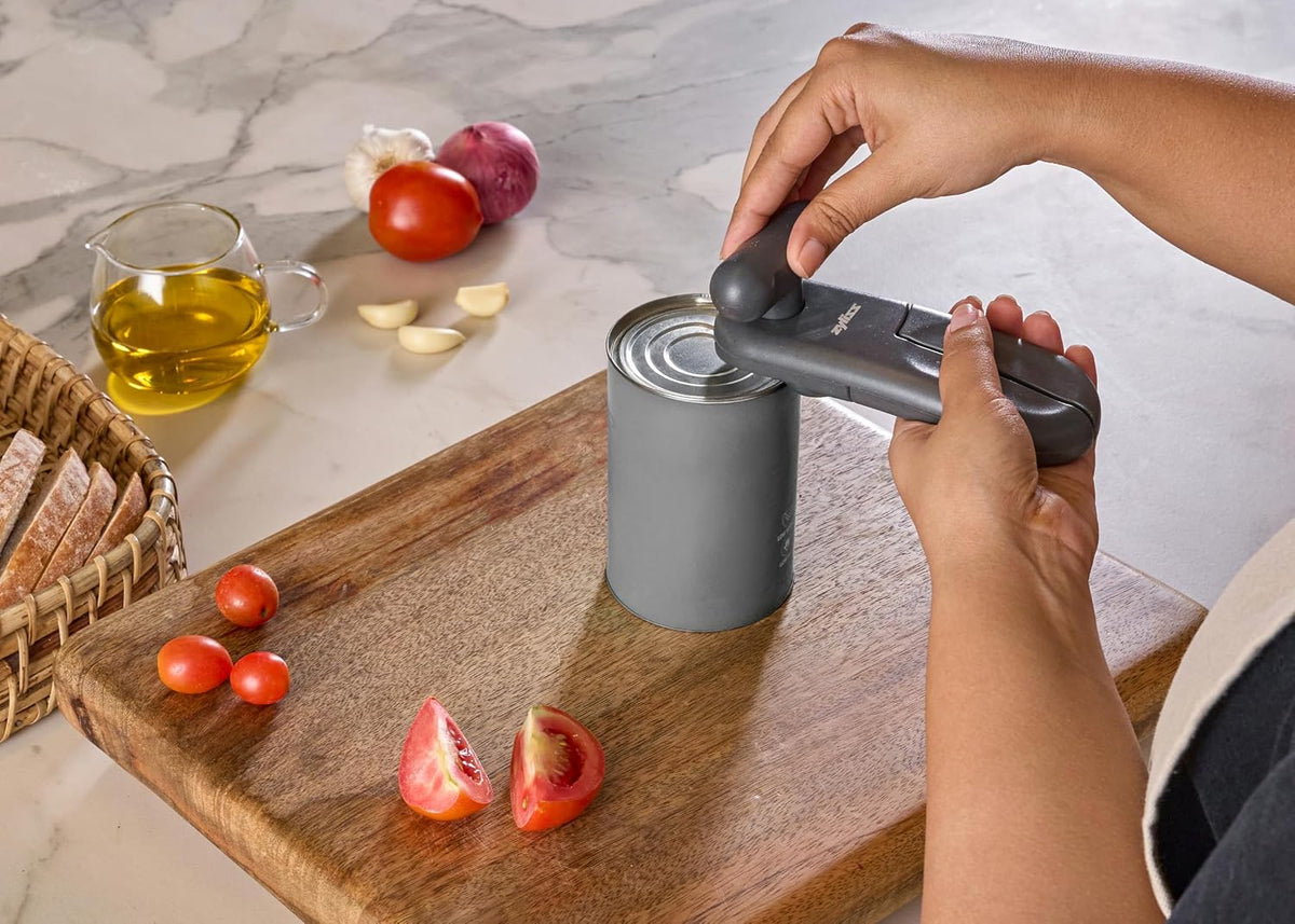 MagiCan Manual Can Opener with Lid Release - Heavy Duty Can Opener - Easy to Use Hand Held - Effortlessly Open Cans - Compact Design - Red