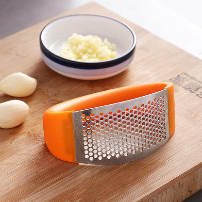 Garlic Press Rocker - Stainless Steel Garlic Crusher, Chopper, Mincer with Silicone Garlic Peeler, Mini Brush Tools For You (Yerrow)