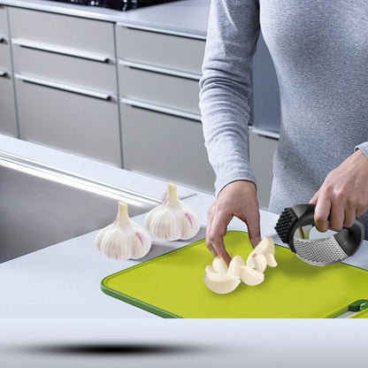Garlic Press Rocker, Stainless Steel Garlic Mincer and Garlic Crusher, Easy-Squeeze Garlic Tool with Peeler and Cleaning Brush for Smashing Garlic