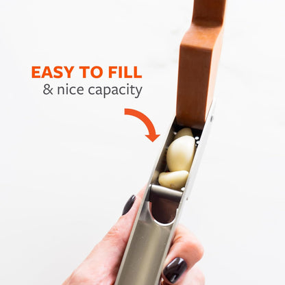 No Mess Garlic Press - Easy-Clean Stainless Steel - Effortless Crushing and Quick Mess-Free Clean-Up - Integrated Cleaner Scraper, Dishwasher safe